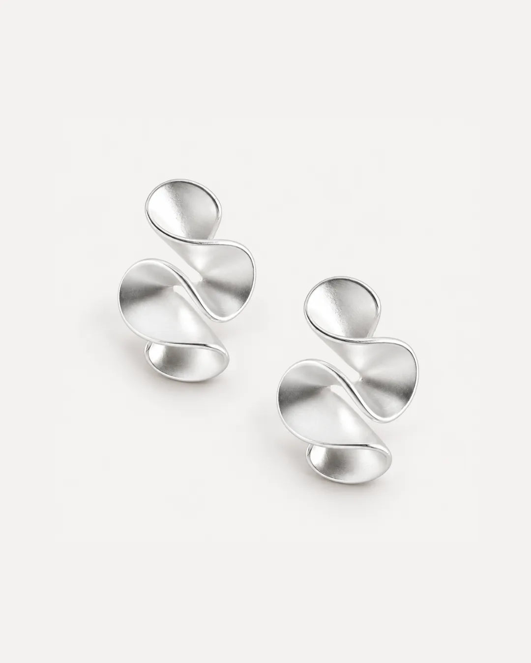 Solenne Sculptural Twist Statement Earrings