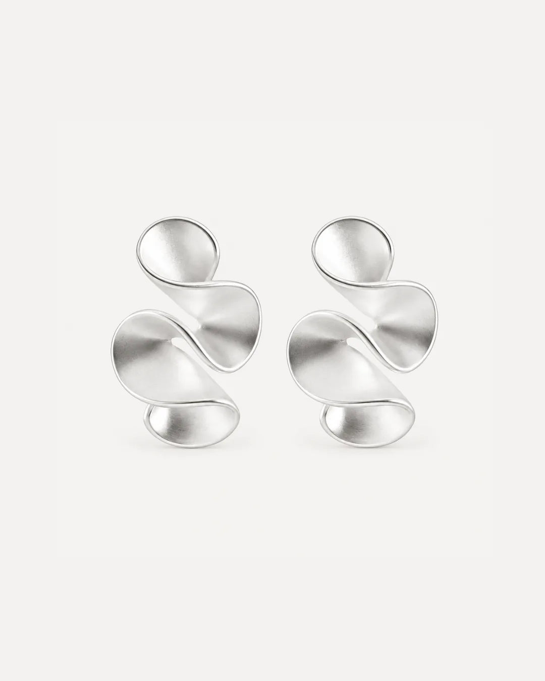 Solenne Sculptural Twist Statement Earrings