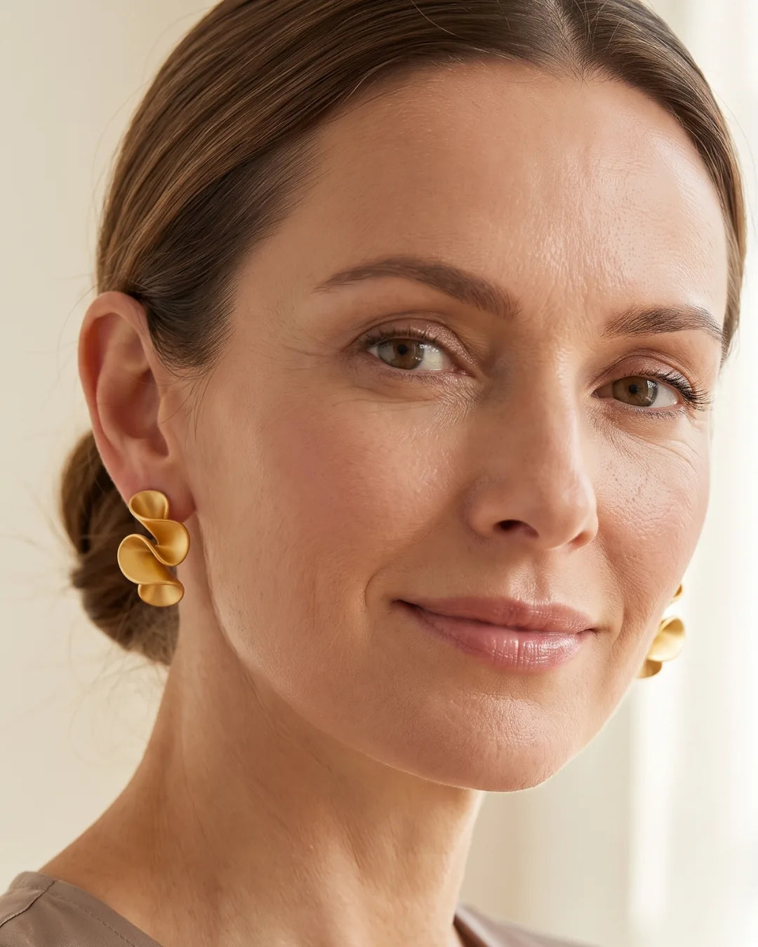 Solenne Sculptural Twist Statement Earrings