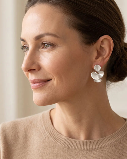Solenne Sculptural Twist Statement Earrings